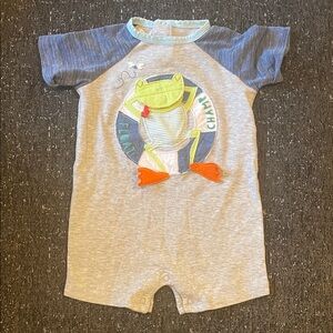 Mud Pie Frog Baby Romper with Green and Red Accents